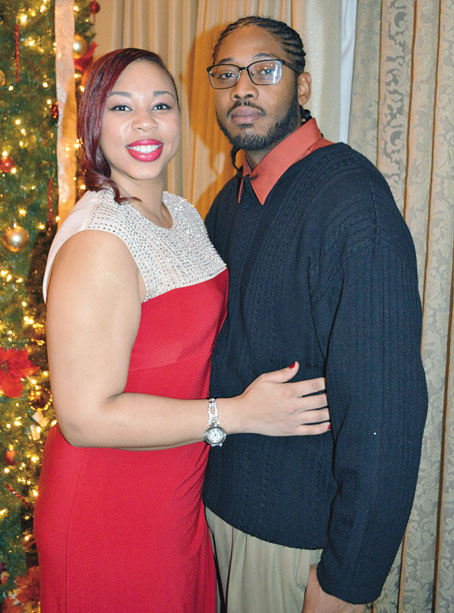 YULETIDE PARTY FIRST TIMERS—Robin Thompson and Roger Jeter