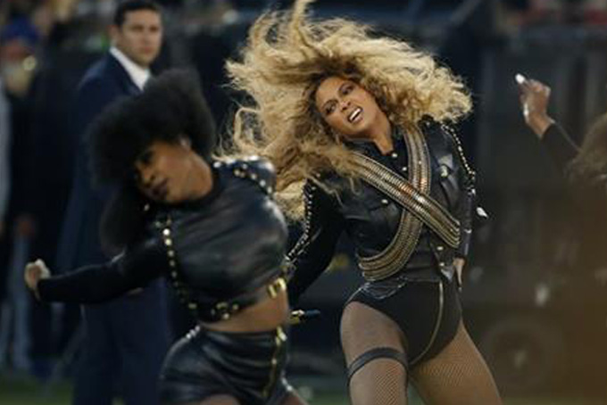 In this Sunday, Feb. 7, 2016 file photo, Beyonce performs during halftime of the NFL Super Bowl 50 football game in Santa Clara, Calif. Beyonce is working overtime this weekend: After releasing a new song Saturday and performing at the Super Bowl on Sunday, she's announced a new stadium tour. The Grammy-winning singer announced her 2016 Formation World Tour in a commercial after she performed at the halftime show with Bruno Mars and Coldplay. (AP Photo/Matt Slocum, File) 