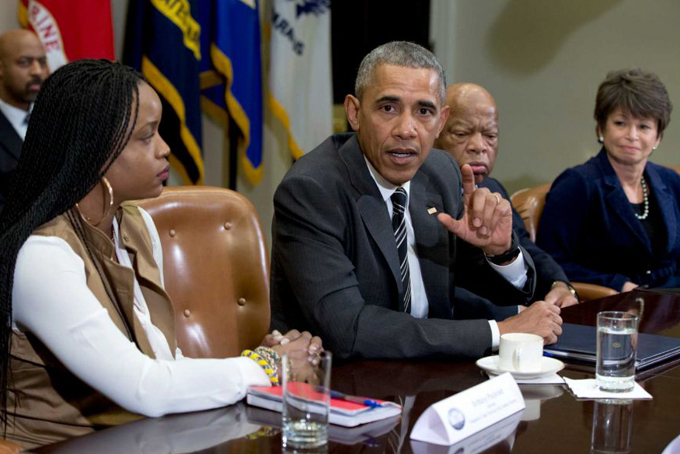 President Barack Obama speaks to the media at a meeting with civil rights leaders in the Roosevelt Room of the White House in Washington, Thursday, Feb. 18, 2016. From left are, Brittany Packnett, the president, Rep, John Lewis, D-Ga., and Senior White House Adviser Valerie Jarrett. During the meeting the president discussed a range of issues, including the Administration’s efforts on criminal justice reform, building trust between law enforcement and the communities they serve and the President’s priorities during his final year in office. Photo: Carolyn Kaster, AP