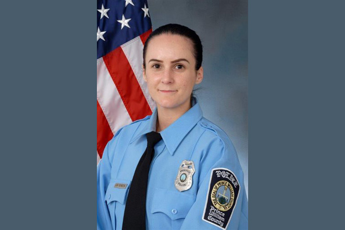 This undated photo provided by the Prince William County Police shows Officer Ashley Guindon. Ronald Williams Hamilton is being held without bond in the Prince William County Adult Detention Center on charges that include murder of a law enforcement officer, Guindon. (Prince William County Police via AP)