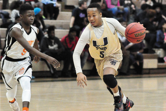 DASHON CRUSE (5) of U-Prep makes a move on Amald Pack of South Hills. Cruse chipped in with 8 points in the U Prep win. 