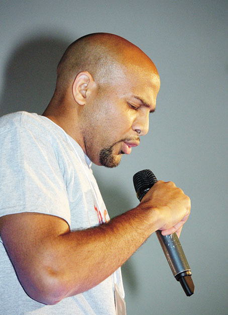 HUSANI THOMPSON giving the opening prayer.