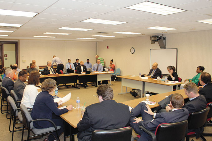 FULL HOUSE—Chairs R. Daniel Lavelle and Ray Gastil open the first meeting of the Affordable Housing Task Force in the CityStats Conference Room in the City-County Building, July 30, 2015. (Courier File Photo/J.L. Martello)