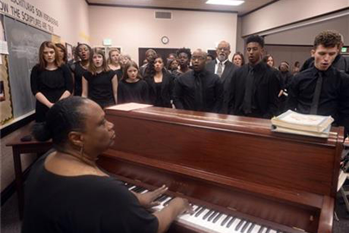 In this photo taken on Sunday, Feb. 7, 2016, LDS Genesis Group Choir rehearse for an upcoming Las Vegas performance, in Salt Lake City. The choir is different from most Latter-day Saints choirs. They sing gospel and soul music. (Al Hartmann/The Salt Lake Tribune via AP) 