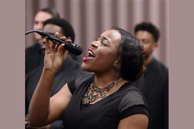 In this photo taken on Sunday, Feb. 7, 2016, LDS Genesis Group Choir rehearse for an upcoming Las Vegas performance, in Salt Lake City. The choir is different from most Latter-day Saints choirs. They sing gospel and soul music. (Al Hartmann/The Salt Lake Tribune via AP)