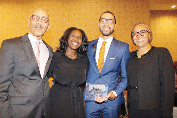 BURLEY FAMILY—From left: Robert Burley, father; Brittini Burley, wife; Brian Burley, honoree, and Anita Burley, mother. 