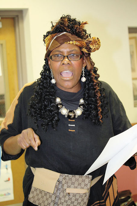 RENEE DRUMMOND-BROWN performing spoken word.