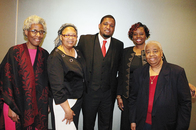 FAMILY SUPPORT—Aunt Sherdina Jones, mother Colleen Conley, honoree Eric Smith, wife Ayisha Morgan-Lee and mother in-law Veronica Morgan-Lee. 