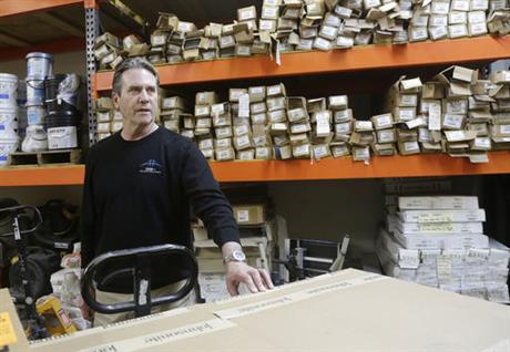 In this March 8, 2016, photo, Mike Patton, CEO of DSB Plus flooring company, is interviewed in his warehouses in Milpitas, Calif. As small companies expand their business into more towns, cities and states, that growth often brings higher expenses from taxes and other government obligations. (AP Photo/Jeff Chiu)