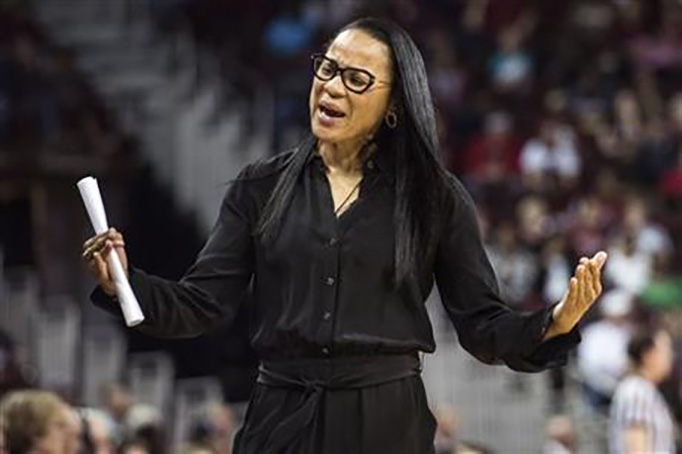 In this Dec. 22, 2015, file photo, South Carolina head coach Dawn Staley gestures to the bench during the first half of an NCAA college basketball game against Elon, in Columbia, S.C.(AP Photo/Sean Rayford, File)