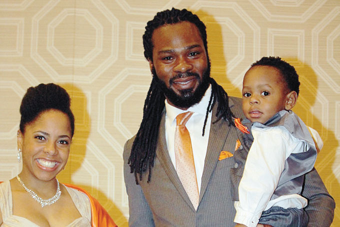 YOUNG POWER COUPLE—Jessica M. Brown, executive assistant, 5A Elite Youth Empowerment; and husband Nathaniel M. Brown, executive director , 5A Elite Youth Empowerment; with son. (Photos by J.L. Martello) 