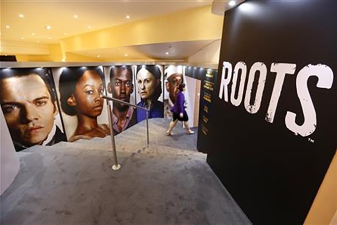 View of the stand of the new tv series "Roots" at the MIPTV, International Television Programme Market, Monday, April 4, 2016, in Cannes, southern France.(AP Photo/Lionel Cironneau)