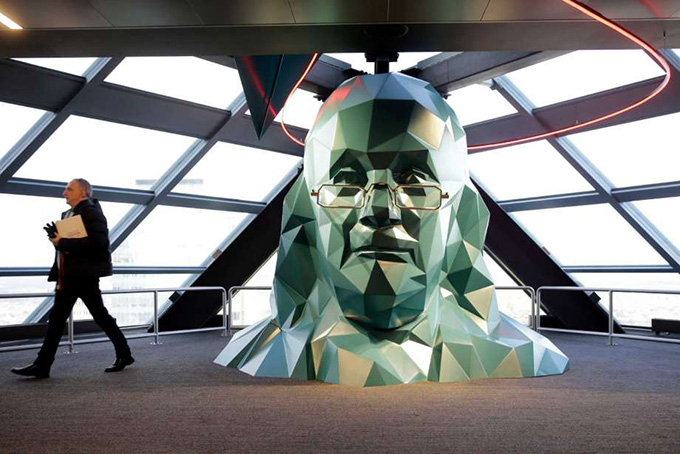 In this Nov. 24, 2015 file photo, a person walks past a sculpture of Benjamin Franklin at the One Liberty Observation Deck in Philadelphia. The City of Brotherly Love will get a lot of attention later this summer during the Democratic National Convention, with attractions ranging from American history classics to new parks and outdoor venues. Photo: Matt Rourke, AP