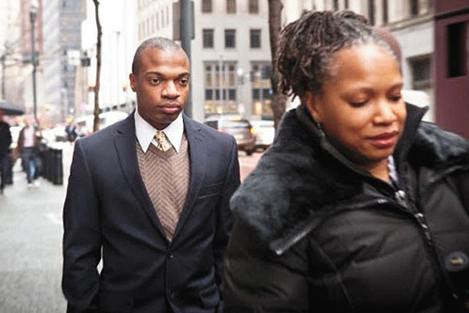 MOVING ON—Jordan Miles, seen here with his mother Terez during a break from his 2014 civil case against three Pittsburgh police officers, has settled with the city of Pittsburgh for $125,000. (Photo by J.L. Martello)