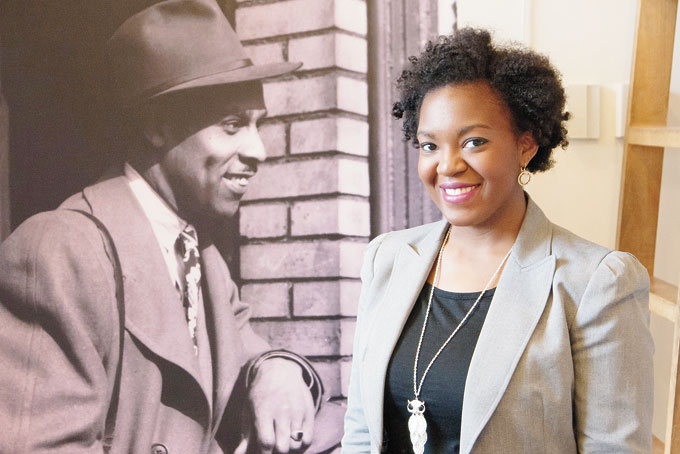 LIVING LEGACY—Dominique Luster, who was inspired by Charles “Teenie” Harris’ photos as a theater student, is the first permanent archivist of the Harris collection at the Carnegie Museum. 