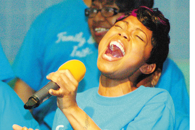 SHAY DAVENPORT leads Family & Friends Choir. (Photos by Rossano P. Stewart)
