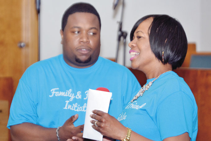SPECIAL PRESENTATION—Parrish Davenport receives gift from Jacki Wright.
