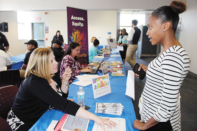 TIFFANY HANDLEY from East Liberty speaking to Kimberly Russo program officer for Early Childhood Education. 