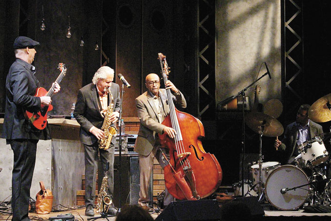 TRAILBLAZING QUARTET—Gary Bartz has been known to many as a trailblazer in the music business from the moment he started playing with Art Blakey at his father’s jazz club in his hometown of Baltimore to playing his own music throughout 57 years as a professional musician. As if his Grammy Award© with McCoy Tyner in 2005 “Illuminations” wasn’t enough to carve out a place for Bartz in the jazz genre, he has broken the mold with more than 40 solo albums and more than 200 as a guest artist. (Photos by J.L. Martello) He recently performed in Pittsburgh at the Cabaret at Theater Square, 655 Penn Ave. Bartz graduated from the Baltimore City College high school and the Juilliard School; his break into the music industry came when filling in with Art Blakey’s band at his father’s club in Baltimore. Bartz has played with Miles Davis, Charles Mingus, Max Roach, McCoy Tyner, and Jackie McLean. His group, the Ntu Troop, combined soul, funk, African music, hard bop, and avant-garde jazz. Bartz was awarded the BNY Mellon Jazz 2015 Living Legacy Award, presented at a special ceremony at The Kennedy Center. He currently teaches at the Oberlin Conservatory of Music in Ohio, when not touring. Above Gary Bartz and his quartet performing on stage. (Photos by J. L. Martello)