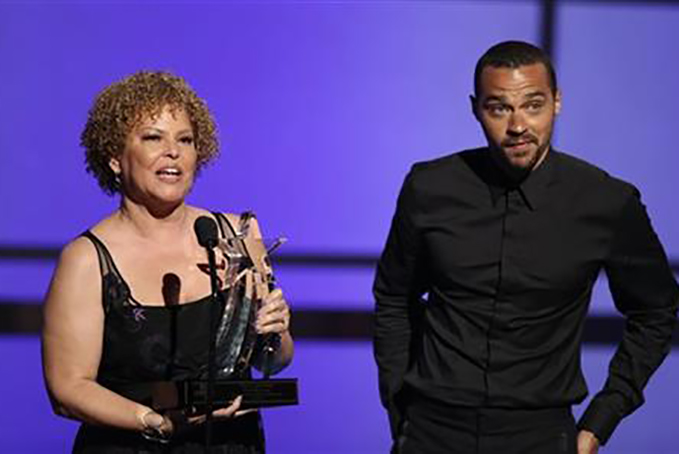 Debra Lee, left, presents the humanitarian award to Jesse Williams at the BET Awards at the Microsoft Theater on Sunday, June 26, 2016, in Los Angeles. (Photo by Matt Sayles/Invision/AP)