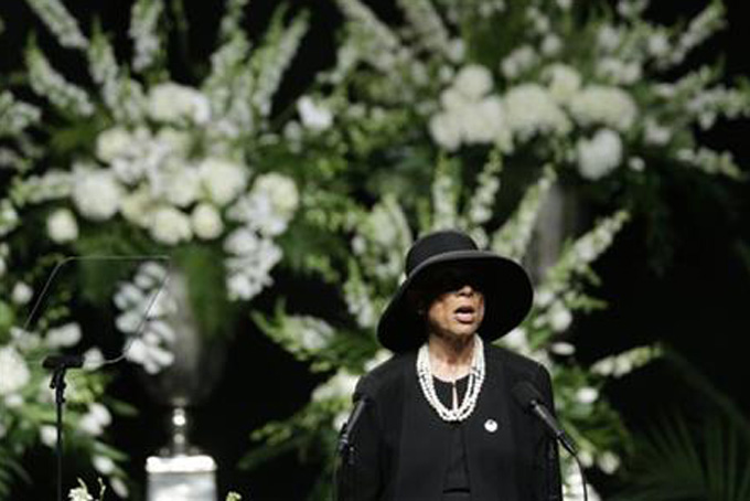 Muhammad Ali's wife Lonnie Ali speaks during his memorial service, Friday, June 10, 2016, in Louisville, Ky. (AP Photo/David Goldman)