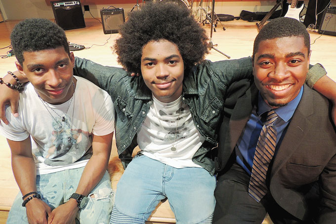 MAKING FRIENDS—Talking after the program are Generation NEXT honorees Robert Rose-Thompson, Raynard Lucas, and Kai Roberts—all of whom have an interest in music. Rose-Thompson and Lucas’ band, Ink, performed at the event. 