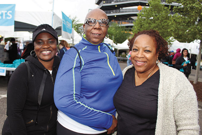REPRESENTING THE HILL—Robin Scott from the Hill, Runa Lester from the Hill, and Sheila Gilmore from the Hill are walking in the Highmark Health Walk.