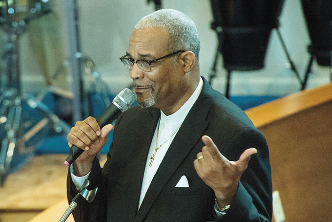 REV. BERNARD TENCH officiating pastor of Second Baptist Church, Beaver Falls.