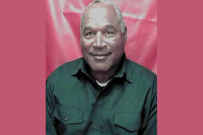 This photo provided by the Nevada Department of Corrections shows O.J. Simpson. Prison officials in Nevada have released a new photo that shows a smiling Simpson. He is serving a sentence of nine to 33 years in a Nevada prison for a 2007 armed robbery and kidnapping conviction. He is eligible for parole next year. (Nevada Department of Corrections via AP)