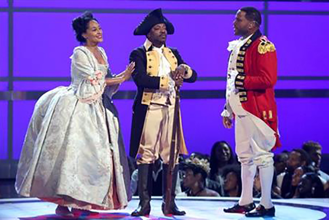 From left, Tracee Ellis Ross, Anthony Hamilton and Anthony Anderson perform a skit dressed as characters from the musical “Hamilton” at the BET Awards at the Microsoft Theater on Sunday, June 26, 2016, in Los Angeles. (Photo by Matt Sayles/Invision/AP)