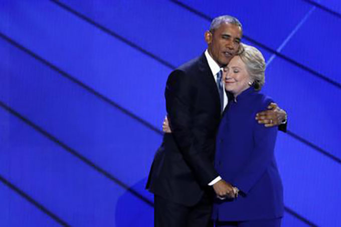 Democratic Presidential nominee Hillary Clinton hugs President Barack Obama after joining him on stage during the third day of the Democratic National Convention in Philadelphia , Wednesday, July 27, 2016. (AP Photo/J. Scott Applewhite)