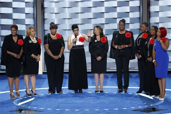 Sybrina Fulton, Geneva Reed-Veal, Lucy McBath, Gwen Carr, Cleopatra Pendleton, Maria Hamilton, Lezley McSpadden and Wanda Johnson from Mothers of the Movement speak. (AP Photo/J. Scott Applewhite)