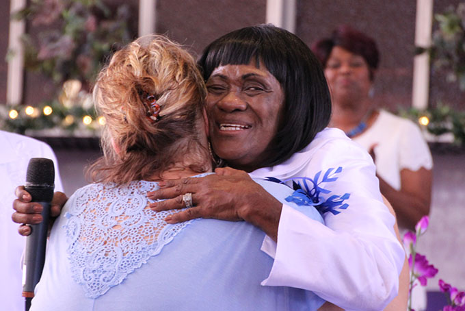 NEW MEMBER WELCOMED—Pastor Lola Thorpe welcoming a new church member.