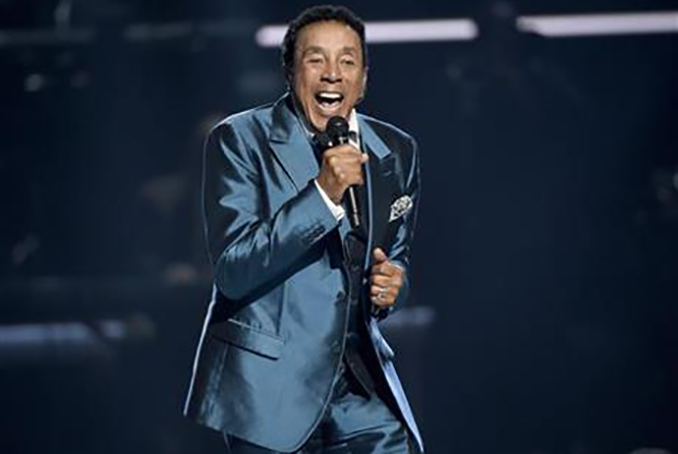 FILE - In this June 28, 2015, file photo, Smokey Robinson performs at the BET Awards in Los Angeles. Robinson has been honored by the Library of Congress with the Gershwin Prize for Popular Song. The national library announced Tuesday, July 5, 2016, that Robinson will receive the award this year. (Photo by Chris Pizzello/Invision/AP, File)