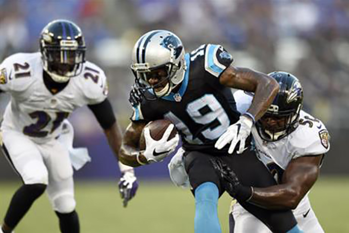 Carolina Panthers wide receiver Ted Ginn (19) is tackled by Baltimore Ravens outside linebacker Albert McClellan (50), with cornerback Lardarius Webb (21) nearby, during the first half of an NFL preseason football game Thursday, Aug. 11, 2016, in Baltimore. (AP Photo/Gail Burton)