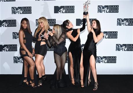 Normani Hamilton, from left, Dinah Jane Hansen, Ally Brooke, Camila Cabello and Lauren Jauregui of Fifth Harmony pose in the press room after winning the awards for song of the summer for “All In My Head (Flex)” and best collaboration video for “Work From Home” at the MTV Video Music Awards at Madison Square Garden on Sunday, Aug. 28, 2016, in New York. (Photo by Evan Agostini/Invision/AP) 