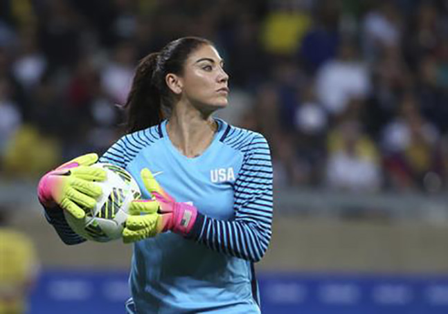 Hope Solo suspended from US soccer team for 6 months In this Aug. 3, 2016, file photo, U.S. goalkeeper Hope Solo takes the ball during a women's Olympic football tournament match against New Zealand in Belo Horizonte, Brazil. (AP Photo/Eugenio Savio, File)