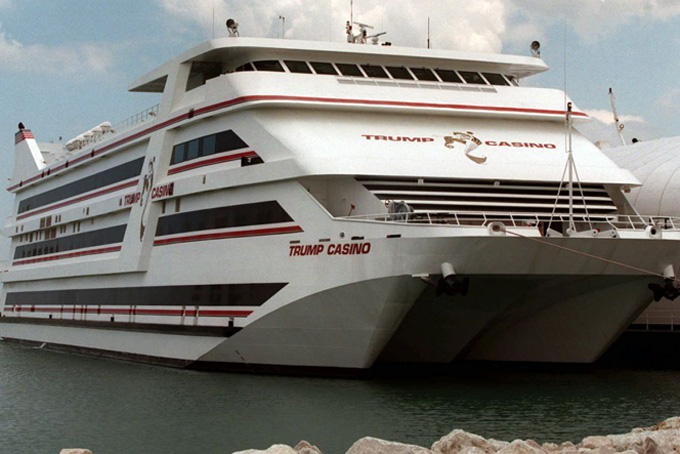 As Trump appeals to black voters, Gary recalls casino deal FILE - In this June 3, 1996, file photo, the Trump Casino sits on the dock in Buffington Harbor in Gary, Ind. Donald Trump’s appeal to black voters sounds familiar in Gary, and not in a good way. In 1993, Trump swooped into Gary on his private jet and pledged to make the down-on-its-luck city great again with a riverboat casino along a Lake Michigan shoreline littered with shuttered factories. Little more than a decade later Trump’s company declared bankruptcy, leaving behind lawsuits and hard feelings in the majority-black city. (AP Photo/Michael Conroy, File)