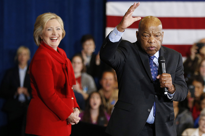 CAMPAIGNING WITH A LEGEND—Democratic presidential candidate Hillary Clinton takes the stage with Rep. John Lewis, D-Ga., right, during a rally Sunday, Feb. 14, in Las Vegas. (AP Photo/John Locher) 