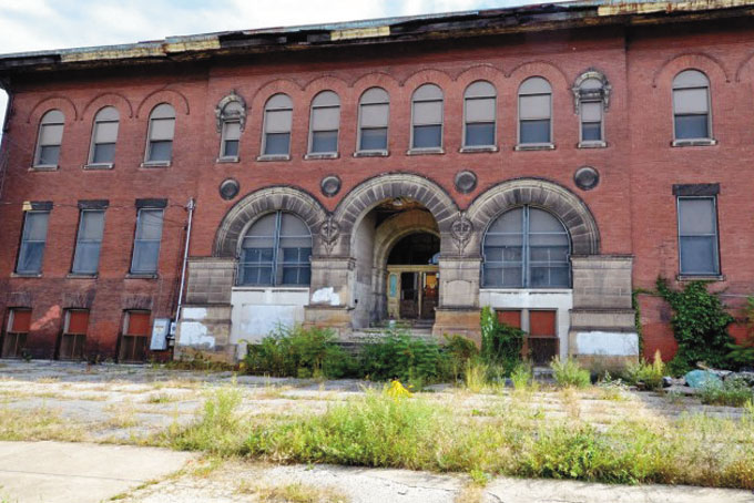 SCHOOL’S STILL OUT—The Larimer School, closed for 36 years, is now owned by the URA. (Photo courtesy of KBK Enterprise)
