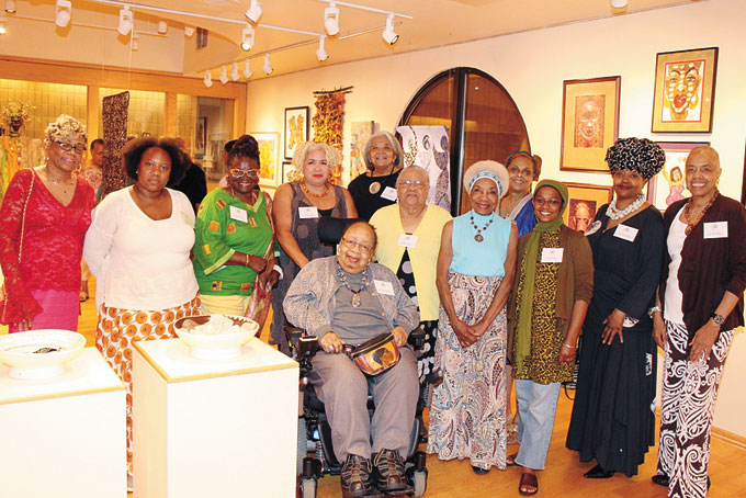 THE ARTISTS—All the participants of the Women of Vision’s exhibition. (Photos by J.L. Martello) 