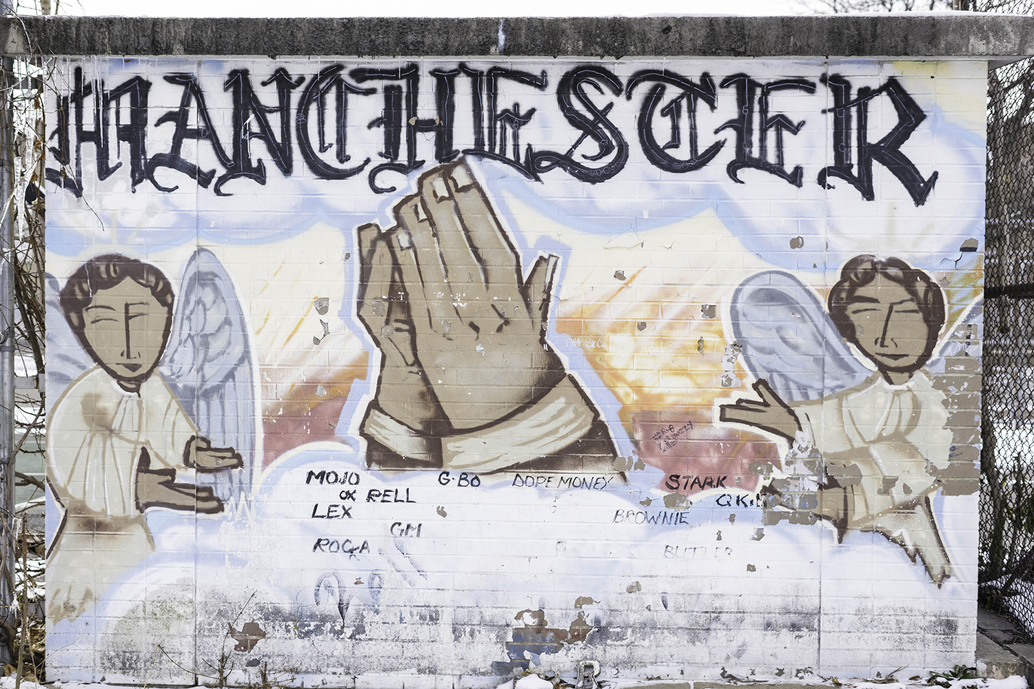 A mural in the Manchester neighborhood of Pittsburgh, adjacent to the basketball court where Scott Walker fatally shot Randy Hawkins in 1994. Walker is serving a sentence of life without parole, but his prison time could eventually be affected by a recent Supreme Court ruling. (Photo by Aaron Warnick/PublicSource)