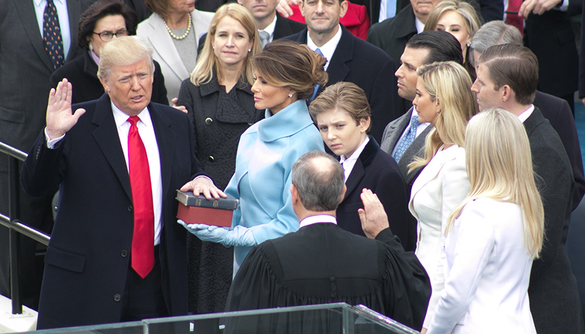 President-elect Donald Trump takes the oath of office during his inauguration at the United States Capitol on January 20, 2017. (Shevry Lassiter/The Washington Informer)