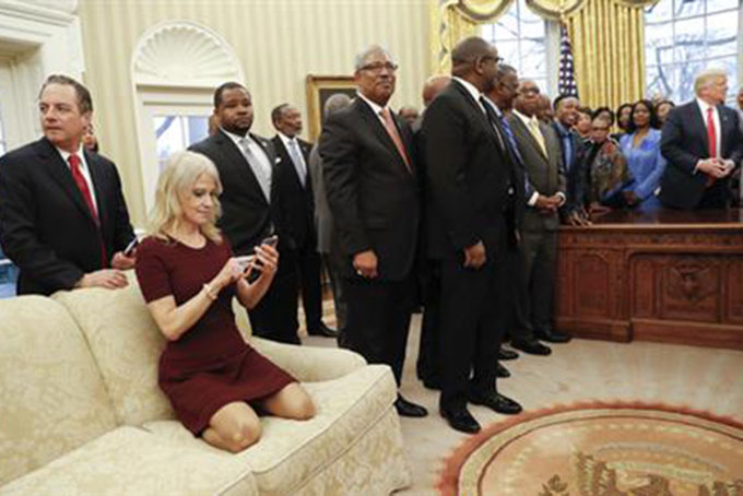 President Donald Trump, right, meets with leaders of Historically Black Colleges and Universities (HBCU) in the Oval Office of the White House in Washington, Monday, Feb. 27, 2017. Also at the meeting are White House Chief of Staff Reince Priebus, left, and Counselor to the President Kellyanne Conway, on the couch. (AP Photo/Pablo Martinez Monsivais) 