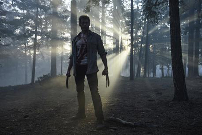 This image released by Twentieth Century Fox shows Hugh Jackman from the film, "Logan." (Ben Rothstein/Twentieth Century Fox via AP) 