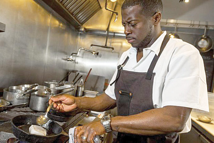 black chef cooking
