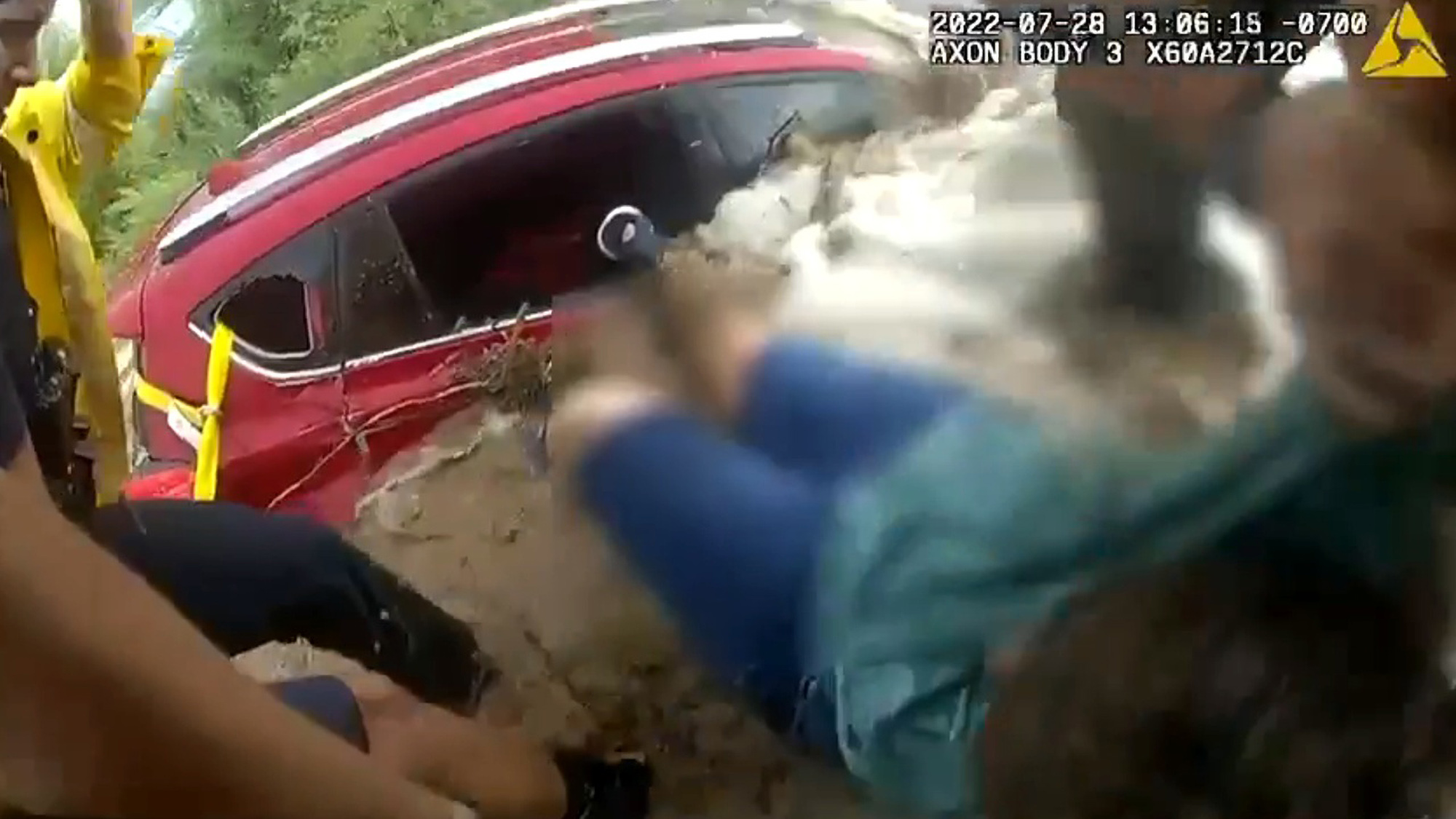 Distraught Arizona woman rescued from flood car without her dog