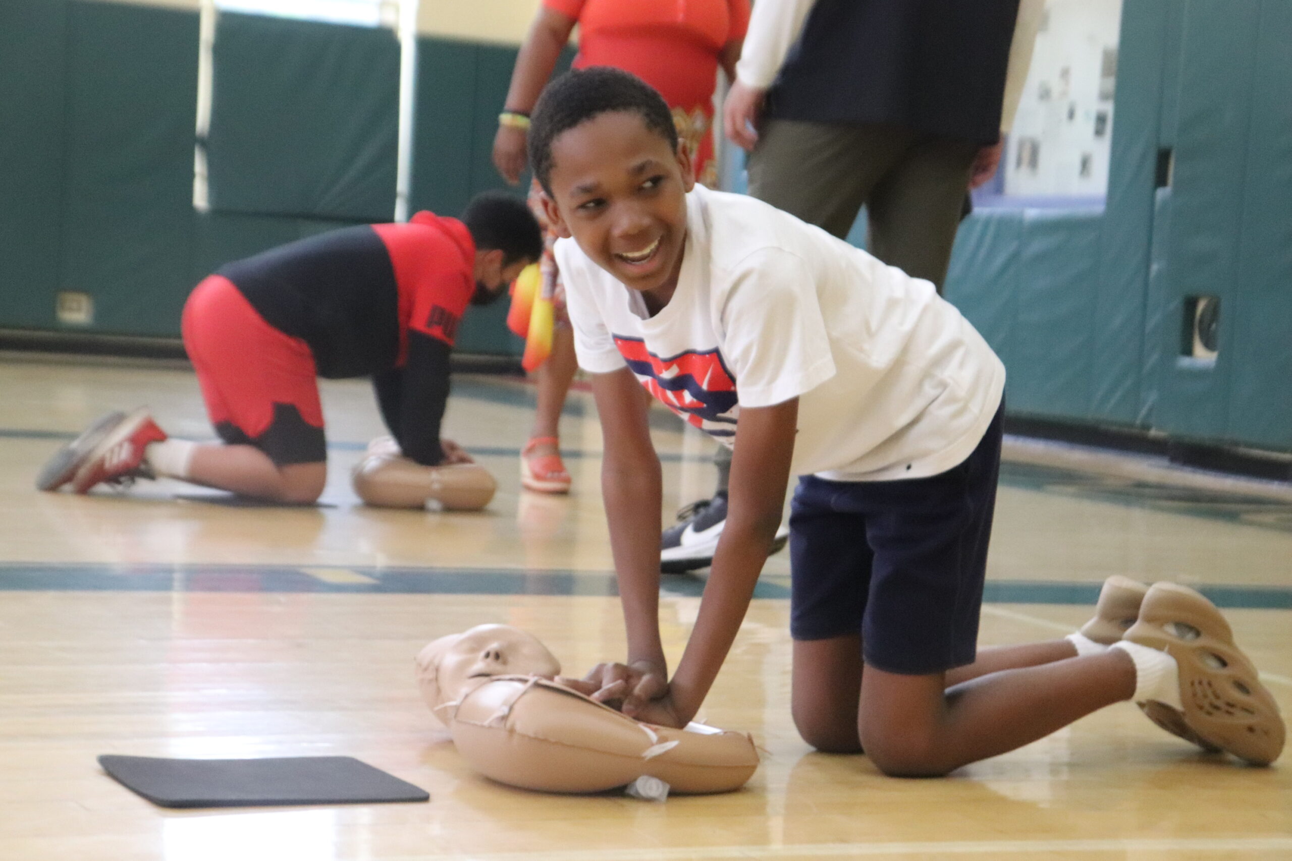 Sterrett Academy students learn CPR with some help from the Pittsburgh  Steelers