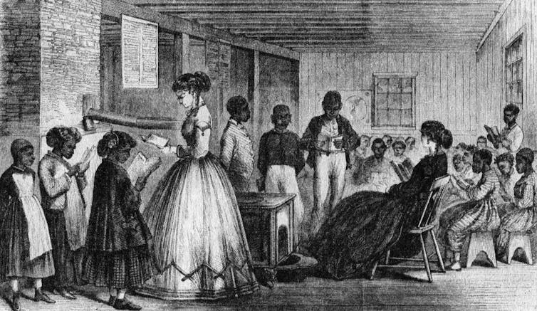 A black and white drawing shows a group of children and two women dressed formally in a classroom.