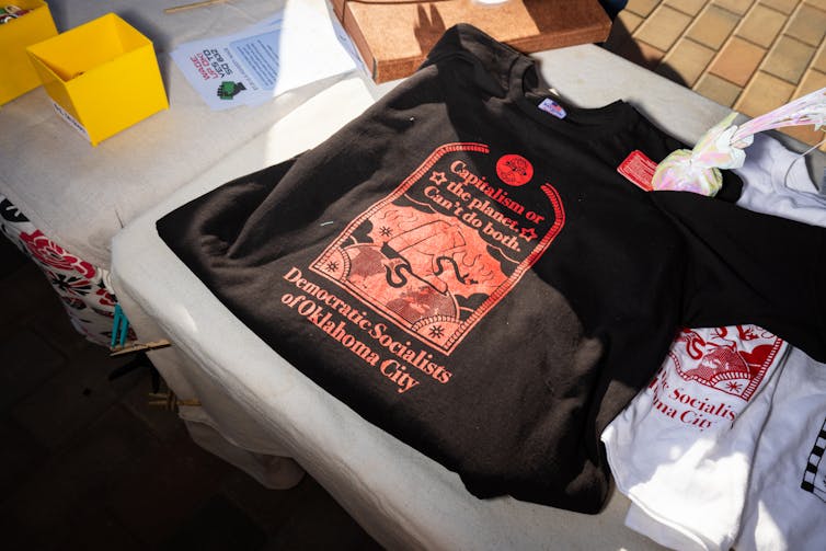A DSA t-shirt for sale that says 'Capitalism or the planet. Can't do both.'